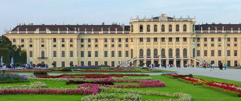 Schönbrunn Palace with flowers blooming out front