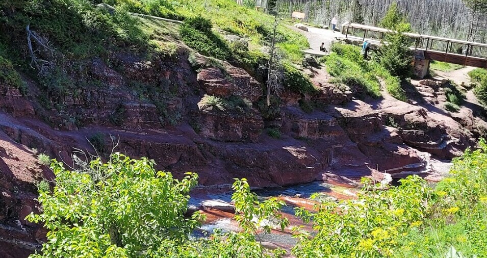 View of a portion of Red Rock Canyon including the trail bridge crossing over the canyon